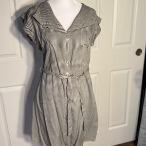 Above knee summer dress with fabric belt tie.